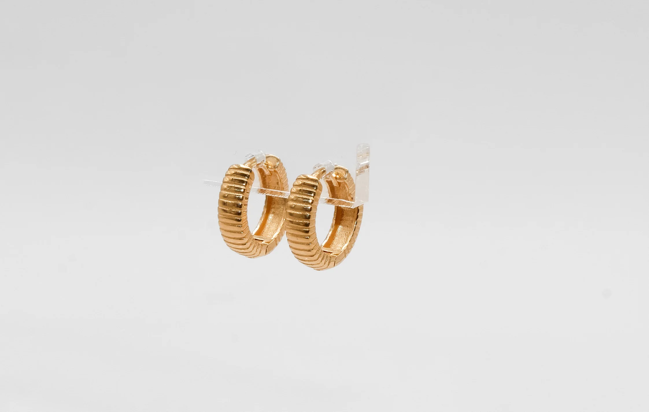 18K Gold Mini Huggies Earrings - Image 2