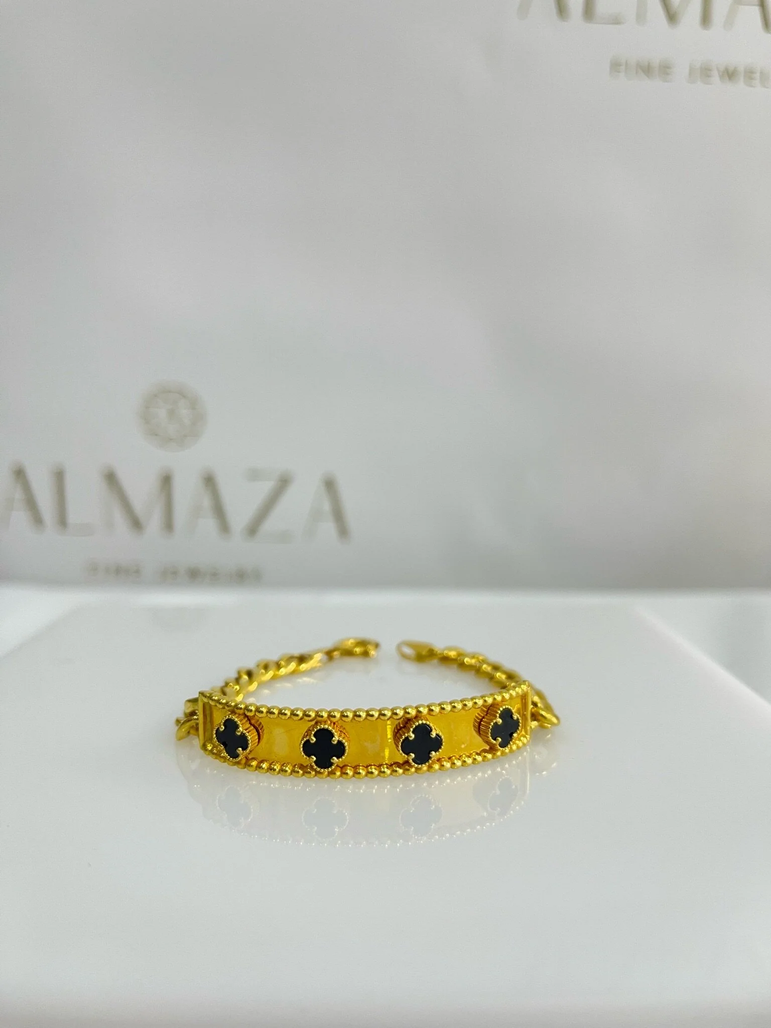 21K Gold Onyx Flower Bracelet